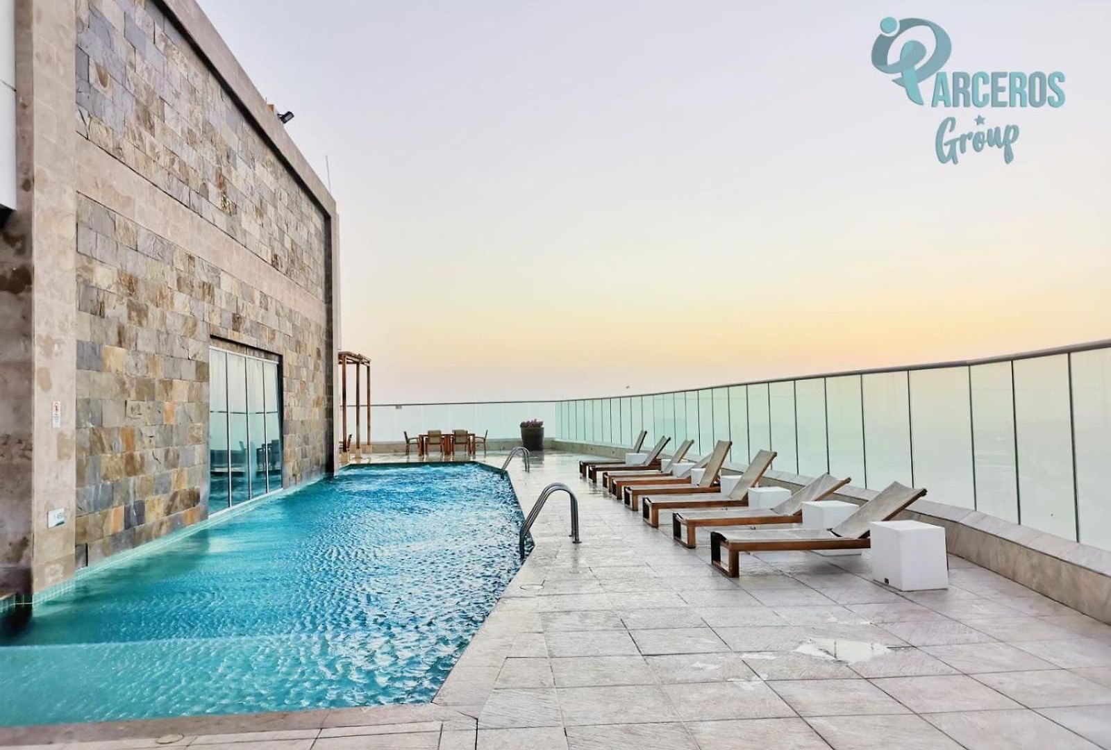Palmetto Sunset Por Parceros Group *