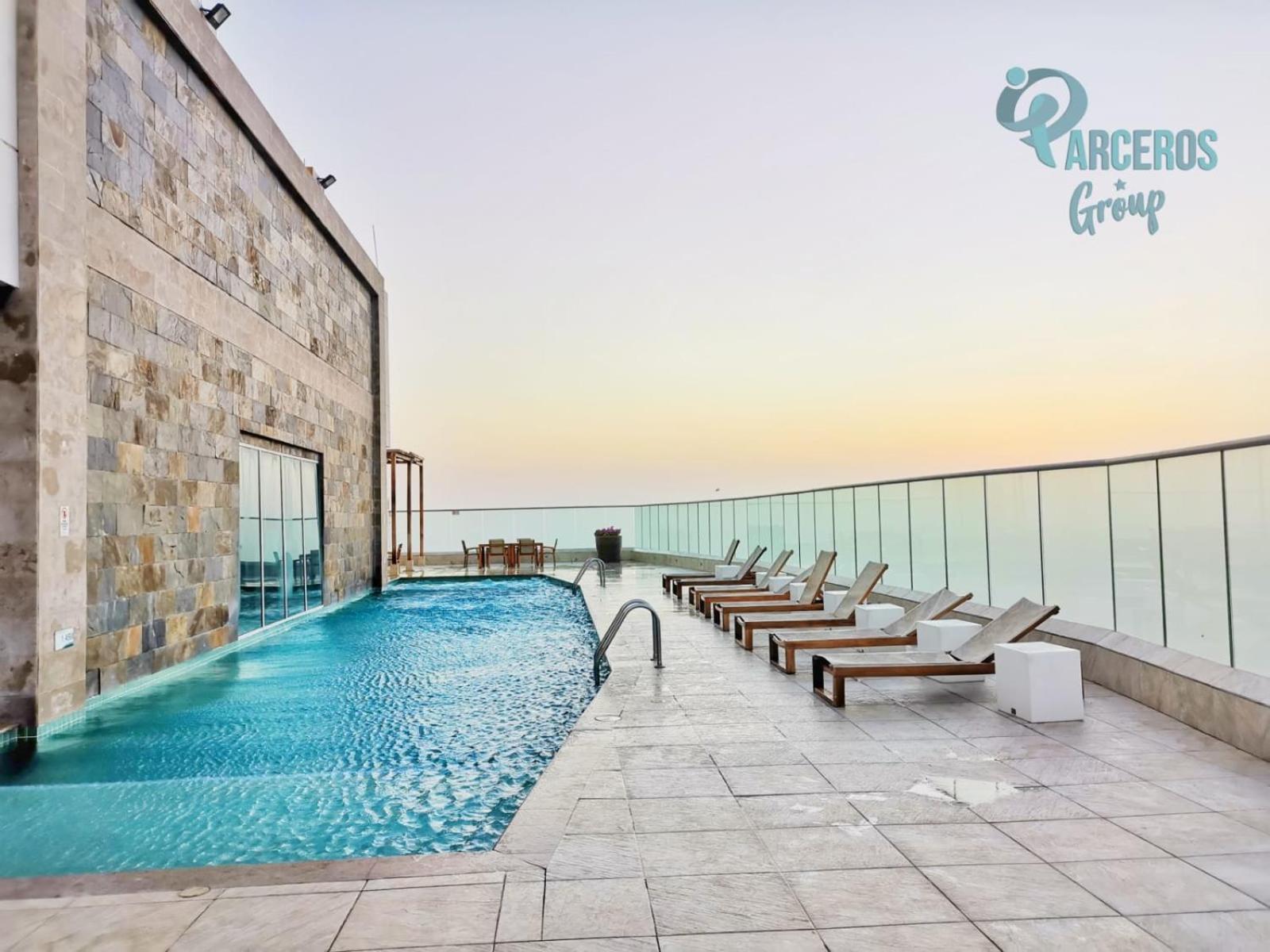 Palmetto Sunset Por Parceros Group *